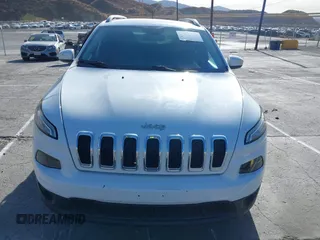 2016 Jeep Cherokee Latitude with VIN 1C4PJLCB9GW149217, listed as a IAAI auction lot 41365164 with 144,702 mi miles. Bid and sale history available at carsss.com. Image 12.