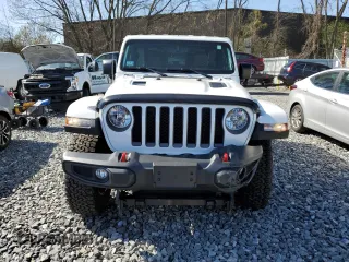 2023 Jeep Wrangler Rubicon with VIN 1C4HJXCG9PW505608, listed as a Copart auction lot 54429105 with 5,461 mi miles and Salvage title. Bid and sale history available at DreamBid. Image 5.