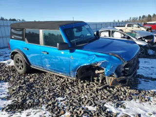 2023 Ford Bronco with VIN 1FMDE5BH0PLB15673, listed as a Copart auction lot 87823915 with 24,749 mi miles and Salvage Title. Bid and sale history available at DreamBid. Image 4.