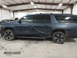2019 Chevrolet Suburban Premier with VIN 1GNSKJKJ8KR169252, listed as a IAAI auction lot 41472231 with 95,266 mi miles and . Bid and sale history available at DreamBid. Image 14.