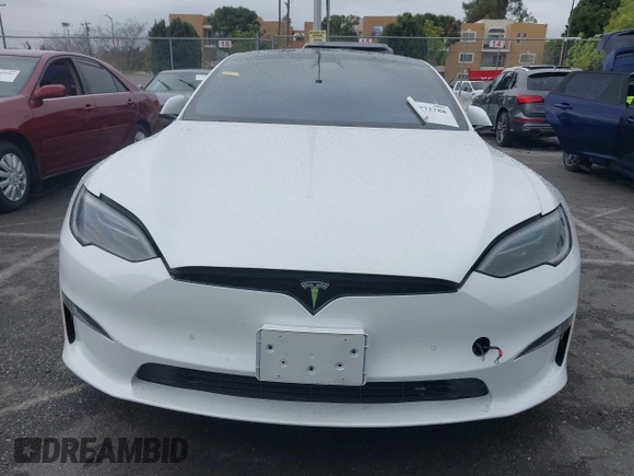 2022 Tesla Model S Plaid with VIN 5YJSA1E65NF488864, listed as a IAAI auction lot 41772788 with 33,915 mi miles and . Bid and sale history available at DreamBid. Image 12.