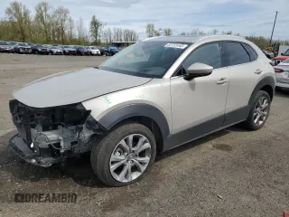 2023 Mazda CX-30 S Premium z VIN 3MVDMBDM2PM501668, wystawiony jako Copart lot #52722445 z przebiegiem 12 309 mil mil oraz Szkoda całkowita • Salvage title. Historia ofert i sprzedaży dostępna na DreamBid. Obrazek 1.