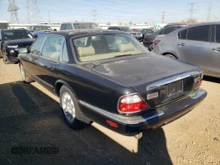 2001 Jaguar XJ with VIN SAJDA23C31LF28667, listed as a Copart auction lot 76983144 with 87,542 mi miles and Clean title. Bid and sale history available at DreamBid. Image 2.