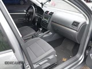 2009 Volkswagen Rabbit S with VIN WVWDB71K69W142447, listed as a IAAI auction lot 41548670 with 175,428 mi miles. Bid and sale history available at carsss.com. Image 5.