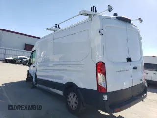 2021 Ford Transit Cargo with VIN 1FTBR1C82MKA90784, listed as a Copart auction lot 47069234 with Not Provided miles and . Bid and sale history available at DreamBid. Image 2.