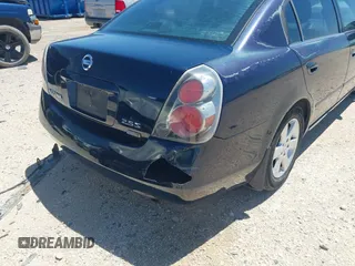 2006 Nissan Altima 2.5 with VIN 1N4AL11D16N442211, listed as a IAAI auction lot 42060046 with 164,950 mi miles. Bid and sale history available at carsss.com. Image 6.