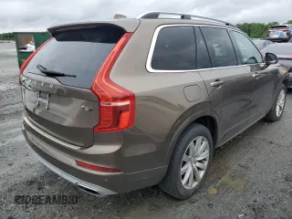2016 Volvo XC90 T6 Momentum z VIN YV4A22PK1G1052417, wystawiony jako Copart lot #58167205 z przebiegiem 126 220 mil mil oraz Czysty tytuł • Clean title. Historia ofert i sprzedaży dostępna na DreamBid. Obrazek 3.