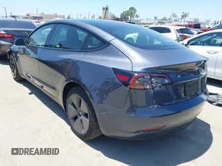 2023 Tesla Model 3 with VIN 5YJ3E1EA1PF545402, listed as a IAAI auction lot 42671354 with 37,948 mi miles and . Bid and sale history available at DreamBid. Image 3.