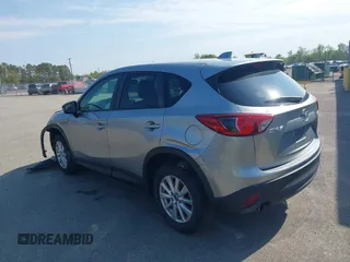 2014 Mazda CX-5 Touring with VIN JM3KE2CY9E0310315, listed as a IAAI auction lot 41943991 with 98,359 mi miles and . Bid and sale history available at carsss.com. Image 3.