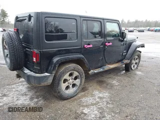 2016 Jeep Wrangler Unlimited 75th Anniversary with VIN 1C4HJWEG3GL181371, listed as a IAAI auction lot 41864965 with 64,259 mi miles and . Bid and sale history available at DreamBid. Image 4.