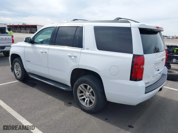 2016 Chevrolet Tahoe LS with VIN 1GNSCAKC1GR139869, listed as a IAAI auction lot 41642073 with 128,380 mi miles. Bid and sale history available at carsss.com. Image 3.