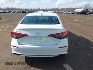 2022 Honda Civic Sport z VIN 2HGFE2F57NH547586, wystawiony jako IAAI lot #41706759 z przebiegiem 33 826 mil mil oraz . Historia ofert i sprzedaży dostępna na DreamBid. Obrazek 16.