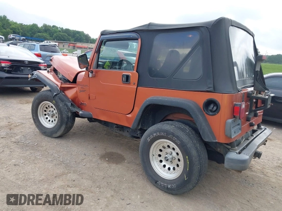 2001 Jeep Wrangler Sport z VIN 1J4FA49S01P341940, wystawiony jako IAAI lot #42542715 z przebiegiem 87 651 mil mil oraz . Historia ofert i sprzedaży dostępna na DreamBid. Obrazek 3.