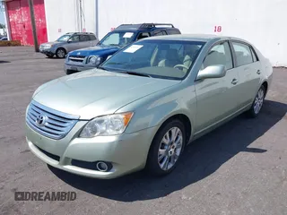 2008 Toyota Avalon XL with VIN 4T1BK36B38U255867, listed as a IAAI auction lot 42180757 with 89,063 mi miles. Bid and sale history available at carsss.com. Image 2.