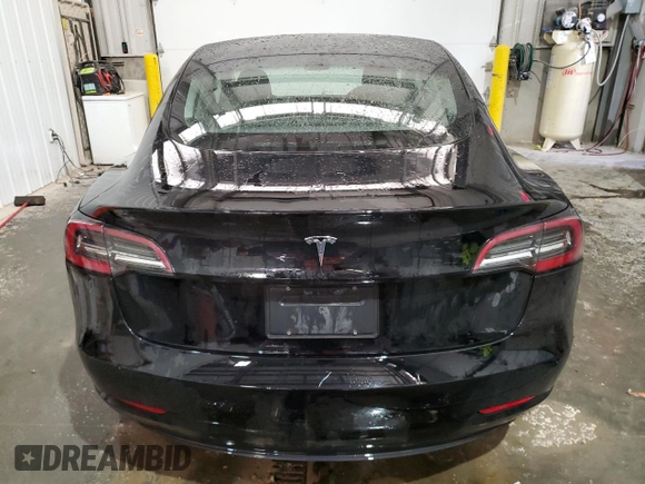 2023 Tesla Model 3 with VIN 5YJ3E1EA8PF451324, listed as a Copart auction lot 88318475 with 74,582 mi miles and Salvage Title. Bid and sale history available at DreamBid. Image 6.