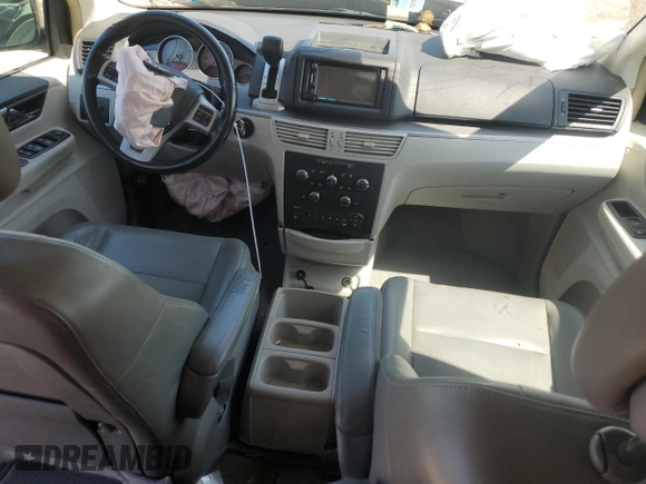 2011 Volkswagen Routan SE with VIN 2V4RW3DG0BR621820, listed as a Copart auction lot 87670825 with 180,222 mi miles and Salvage title. Bid and sale history available at DreamBid. Image 8.