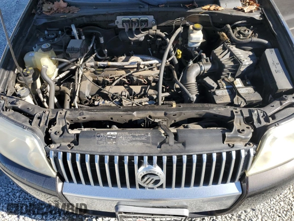 2006 Mercury Mariner Convenience z VIN 4M2YU56Z06KJ00794, wystawiony jako Copart lot #79389584 z przebiegiem 211 103 mil mil oraz Szkoda całkowita • Salvage title. Historia ofert i sprzedaży dostępna na DreamBid. Obrazek 12.