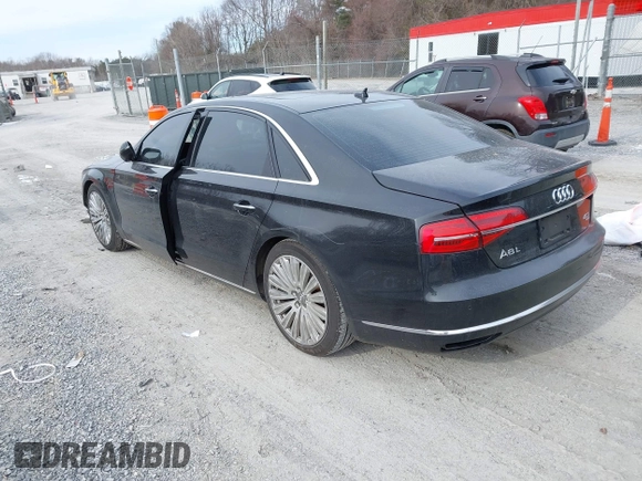 2015 Audi A8 L 4.0T with VIN WAU32AFD7FN006233, listed as a IAAI auction lot 41353034 with 119,693 mi miles. Bid and sale history available at carsss.com. Image 3.