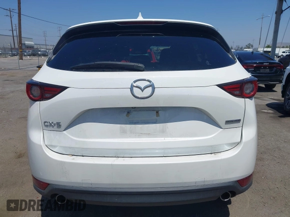 2020 Mazda CX-5 Grand Touring with VIN JM3KFADM9L0821930, listed as a IAAI auction lot 42549986 with 29,929 mi miles and . Bid and sale history available at DreamBid. Image 16.