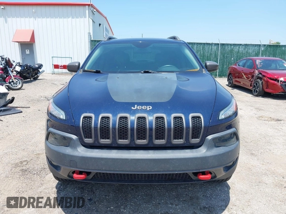 2015 Jeep Cherokee Trailhawk with VIN 1C4PJMBS3FW704622, listed as a IAAI auction lot 42465702 with 96,831 mi miles and . Bid and sale history available at DreamBid. Image 12.