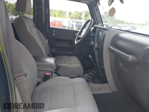 2007 Jeep Wrangler Unlimited Sahara with VIN 1J4GB59167L221686, listed as a IAAI auction lot 42473996 with 151,065 mi miles and . Bid and sale history available at DreamBid. Image 5.