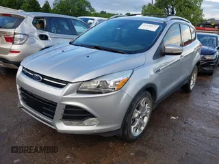 2013 Ford Escape Titanium with VIN 1FMCU0J90DUC13877, listed as a IAAI auction lot 42370172 with 119,745 mi miles and . Bid and sale history available at DreamBid. Image 2.