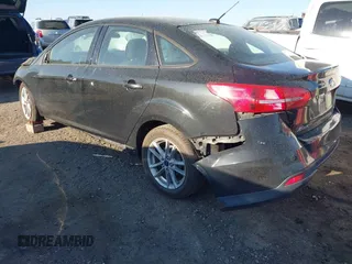 2015 Ford Focus SE with VIN 1FADP3F29FL210973, listed as a IAAI auction lot 41874367 with 128,705 mi miles. Bid and sale history available at carsss.com. Image 3.