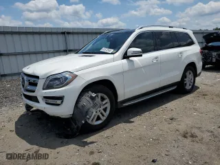 2016 Mercedes-Benz GL with VIN 4JGDF6EE4GA711241, listed as a Copart auction lot 61673364 with 124,547 mi miles and Salvage Title. Bid and sale history available at carsss.com. Image 1.
