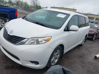 2012 Toyota Sienna LE AAS with VIN 5TDKK3DC3CS208853, listed as a IAAI auction lot 42205012 with 197,286 mi miles. Bid and sale history available at carsss.com. Image 17.