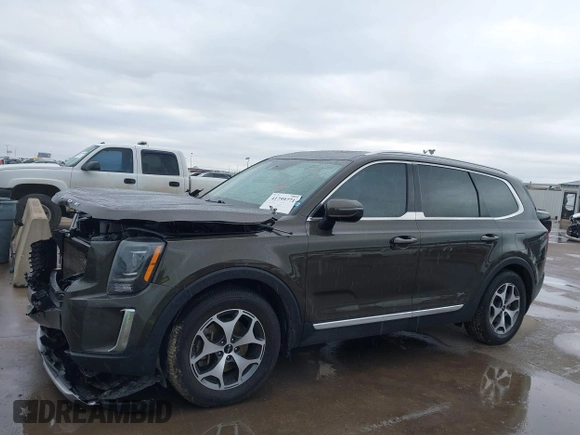 2022 Kia Telluride EX z VIN 5XYP3DHC3NG222108, wystawiony jako IAAI lot #41759771 z przebiegiem 129 098 mil mil oraz . Historia ofert i sprzedaży dostępna na DreamBid. Obrazek 9.