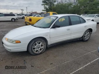 2000 Oldsmobile Intrigue GX z VIN 1G3WH52H8YF257547, wystawiony jako Copart lot #79727714 z przebiegiem 132 156 mil mil oraz Szkody całkowita. Historia ofert i sprzedaży dostępna na DreamBid. Obrazek 1.