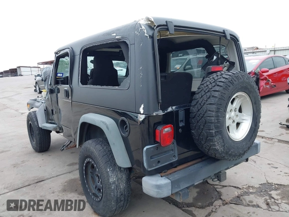 2004 Jeep Wrangler Sport with VIN 1J4FA49S64P794559, listed as a IAAI auction lot 41644201 with 107,445 mi miles. Bid and sale history available at carsss.com. Image 3.
