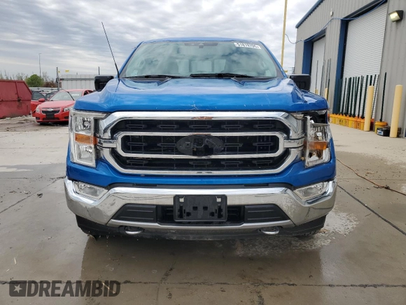 2021 Ford F-150 XL with VIN 1FTFX1E82MKE64671, listed as a Copart auction lot 51819705 with 34,913 mi miles and Salvage title. Bid and sale history available at DreamBid. Image 5.