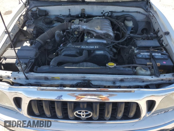 2004 Toyota Tacoma PreRunner z VIN 5TEGN92N14Z331415, wystawiony jako Copart lot #56596545 z przebiegiem 339 810 mil mil oraz Szkoda całkowita • Salvage title. Historia ofert i sprzedaży dostępna na DreamBid. Obrazek 11.