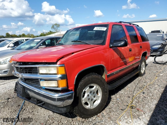 1997 Chevrolet Tahoe with VIN 1GNEK13R2VJ430914, listed as a Copart auction lot 74280024 with 209,824 mi miles and Salvage Title. Bid and sale history available at carsss.com. Image 1.