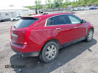 2016 Cadillac SRX Luxury Collection with VIN 3GYFNEE34GS503846, listed as a IAAI auction lot 42211427 with 121,454 mi miles and . Bid and sale history available at DreamBid. Image 4.