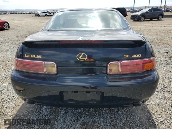1997 Lexus SC 400 z VIN JT8CH32Y6V1000062, wystawiony jako Copart lot #51287595 z przebiegiem 243 624 mil mil oraz Szkody całkowita. Historia ofert i sprzedaży dostępna na DreamBid. Obrazek 6.