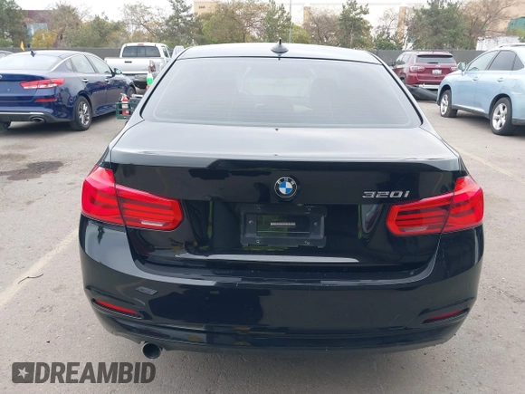 2018 BMW 3 Series 320i with VIN WBA8E1G54JNU93257, listed as a IAAI auction lot 41719141 with 144,381 mi miles. Bid and sale history available at carsss.com. Image 16.