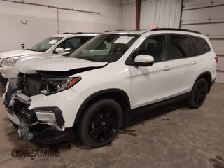 2022 Honda Pilot Special Edition with VIN 5FNYF6H27NB105041, listed as a IAAI auction lot 41916708 with 15,848 mi miles and . Bid and sale history available at DreamBid. Image 19.