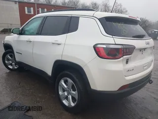 2019 Jeep Compass Latitude with VIN 3C4NJDBB6KT847829, listed as a IAAI auction lot 41476956 with 58,423 mi miles. Bid and sale history available at carsss.com. Image 3.