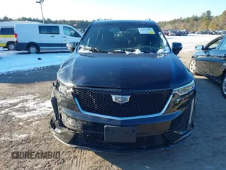 2024 Cadillac XT6 AWD Sport z VIN 1GYKPHRS4RZ700307, wystawiony jako IAAI lot #41257556 z przebiegiem 18 292 mil mil oraz . Historia ofert i sprzedaży dostępna na DreamBid. Obrazek 12.
