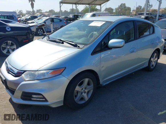2012 Honda Insight LX with VIN JHMZE2H54CS004368, listed as a IAAI auction lot 42336248 with 83,410 mi miles and . Bid and sale history available at DreamBid. Image 2.