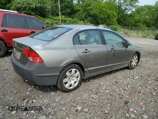 2006 Honda Civic LX z VIN 2HGFA165X6H518462, wystawiony jako Copart lot #59694195 z przebiegiem 101 556 mil mil oraz Czysty tytuł • Clean title. Historia ofert i sprzedaży dostępna na DreamBid. Obrazek 3.