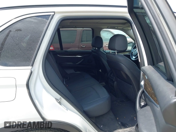 2015 BMW X5 xDrive35i z VIN 5UXKR0C57F0K62448, wystawiony jako IAAI lot #42321842 z przebiegiem 198 839 mil mil oraz . Historia ofert i sprzedaży dostępna na DreamBid. Obrazek 8.