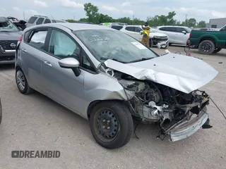 2014 Ford Fiesta S with VIN 3FADP4TJ9EM212897, listed as a IAAI auction lot 42422212 with Not provided miles and . Bid and sale history available at DreamBid. Image 1.