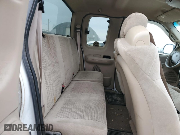 2001 Ford F-150 XL z VIN 1FTRX17W81NA56565, wystawiony jako Copart lot #45876055 z przebiegiem 241 522 mil mil oraz Szkoda całkowita • Salvage title. Historia ofert i sprzedaży dostępna na DreamBid. Obrazek 10.