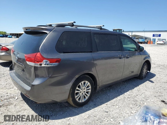 2013 Toyota Sienna XLE AAS with VIN 5TDYK3DC2DS372879, listed as a Copart auction lot 52174275 with 213,923 mi miles and Clean Title. Bid and sale history available at carsss.com. Image 3.