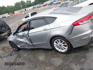2020 Ford Fusion SE with VIN 3FA6P0HD5LR150418, listed as a IAAI auction lot 42347924 with 87,817 mi miles and . Bid and sale history available at DreamBid. Image 14.