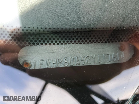 2002 Ford Thunderbird Hardtop Premium z VIN 1FAHP60A92Y117614, wystawiony jako Copart lot #59344735 z przebiegiem 83 723 mil mil oraz Szkoda całkowita • Salvage title. Historia ofert i sprzedaży dostępna na DreamBid. Obrazek 13.