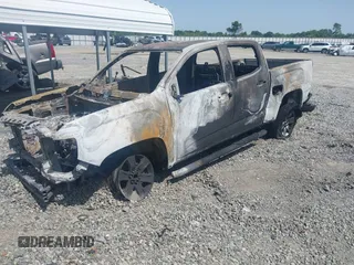 2018 GMC Canyon 2WD SLE z VIN 1GTG5CEN2J1280716, wystawiony jako IAAI lot #42295776 z przebiegiem Nie podano mil oraz . Historia ofert i sprzedaży dostępna na DreamBid. Obrazek 2.
